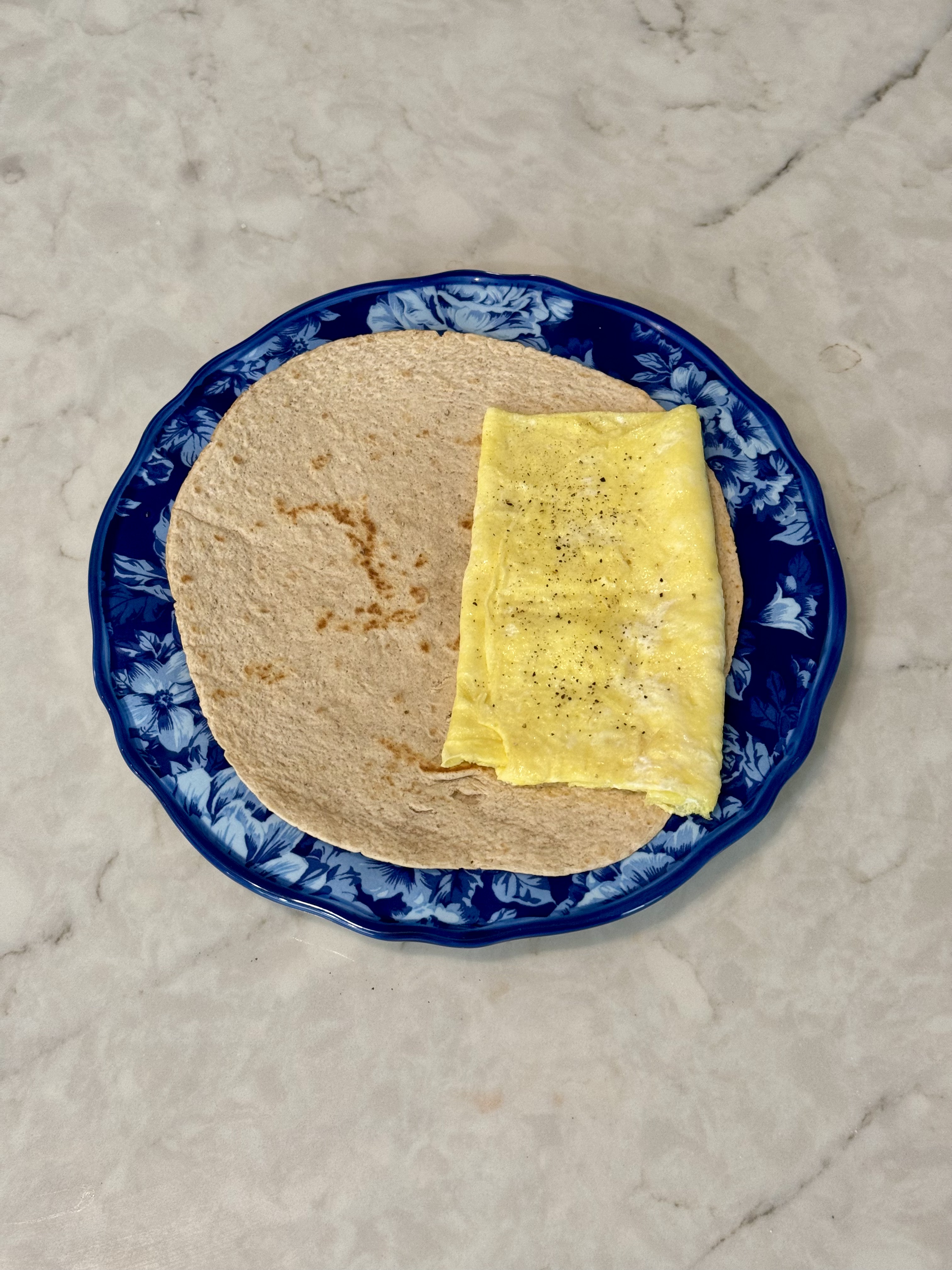 Egg layered onto tortilla