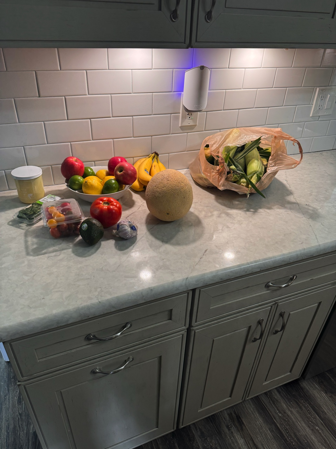 Fresh produce and groceries on the kitchen counter